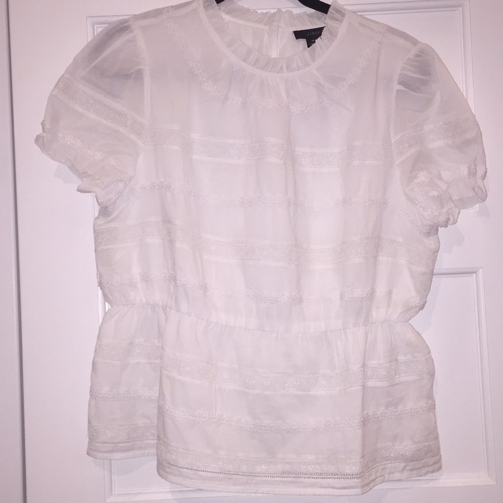 Brand new white daisy-chain peplum blouse